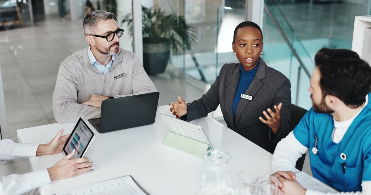 Doctors and nurses collaborating on patient care in a clinic